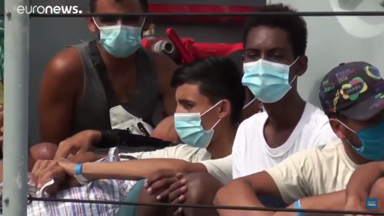 migranti positivi